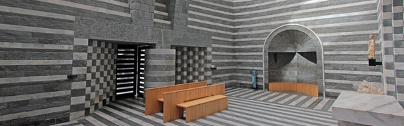 Interior of the church with contrasting grey and white geometric patterns