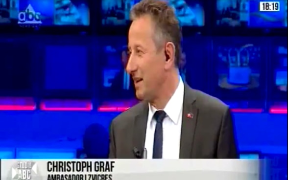 Swiss Ambassador in Albania Christoph Graf talking about decentralisation at ABC News television