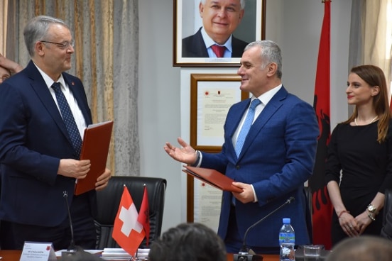 Swiss Ambassador in Albania Adrian Maître (left) after signing agreement on new assistance with the Head of Albania's Supreme State Audit Bujar Leskaj