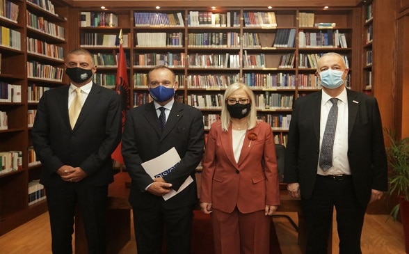 Secretary General of Albania's Parliament Genc Gjoncaj, Head of OSCE Presence in Albania Vincenzo Del Monaco, Speaker of Albania's Parliament Lindita Nikolla, and Swiss Ambassador Adrian Maître after the signature of the donation act on Virtual Desktop Infrastructure. ©