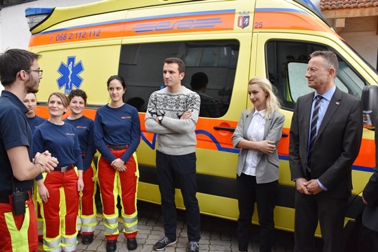 Staff at the Emergency Response Albania with Mayor of Tirana Erion Veliaj and Swiss Ambassador Christoph Graf