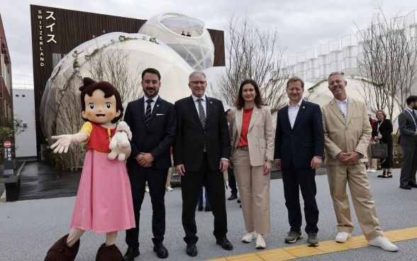 From left: Heidi(The official mascot of the Swiss pavilion), Ambassador Alexandre Edelmann (Head of Presence Switzerland), Ms. Maja Riniker(President of the National Council),  Mr. Markus Seiler(Secretary General of the FDFA), Ambassador Roger Dubach,  Manuel Salchli (Commissioner General of the Swiss Pavilion at Expo 2025 Osaka)