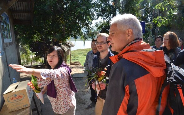 Mr. Thomas Greminger, Mr. Tim Enderlin, Ms. Nithsa Vongphanakhone on a project visit to a Poverty Reduction Fund village.