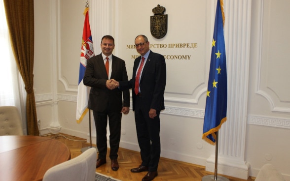 Swiss Ambassador Urs Schmid with Serbian Minister of Economy Slobodan Cvetkovic