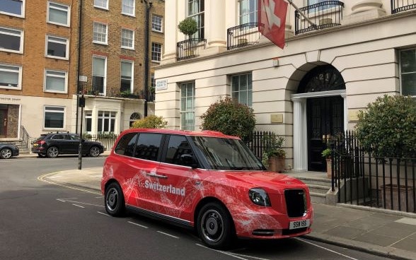 a car parked in front of a building