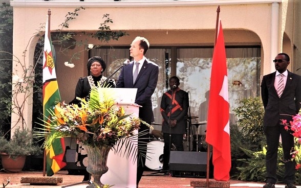 Ambassador of Switzerland to Zimbabwe and Malawi, Mr. Niculin Jäger, addressing guests at the 728th Swiss National Day celebrations in Harare. 