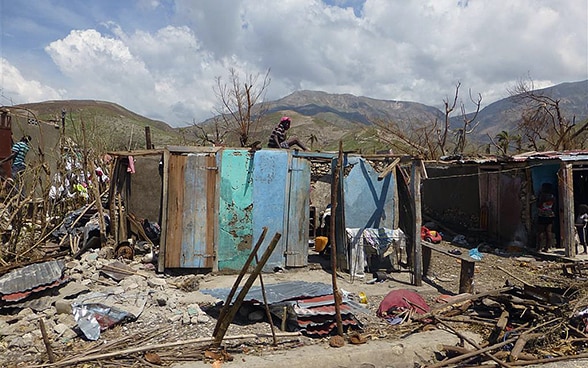 Makeshift homes damaged by Hurricane Matthew in Haiti.