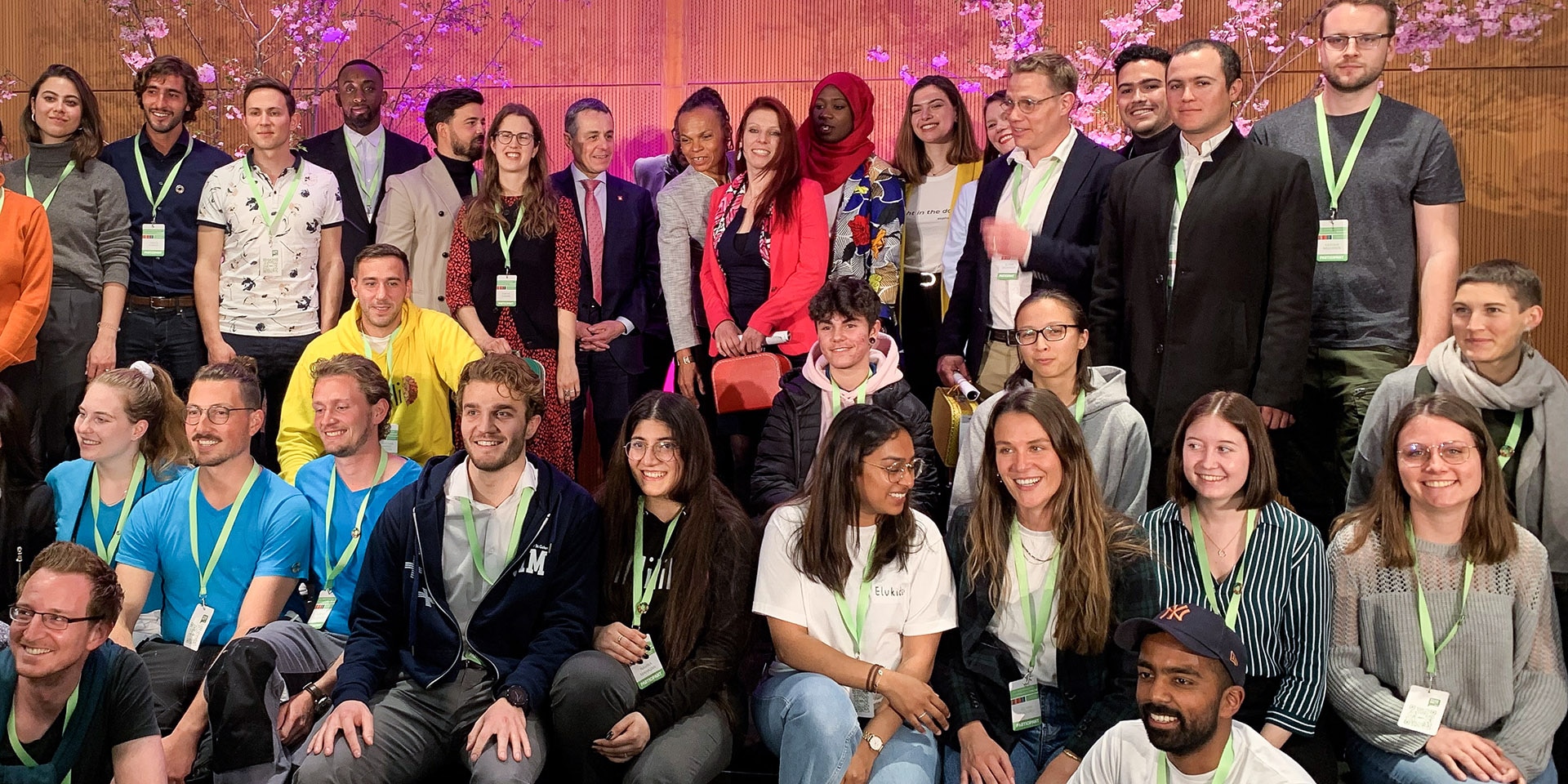 A group of young people pose for a photo.