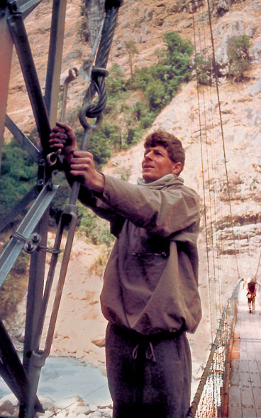 Swiss engineer Hans Aschmann on the construction site of a suspension bridge in Nepal in 1961.