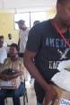 Haitians are being given boxes of hygiene products.