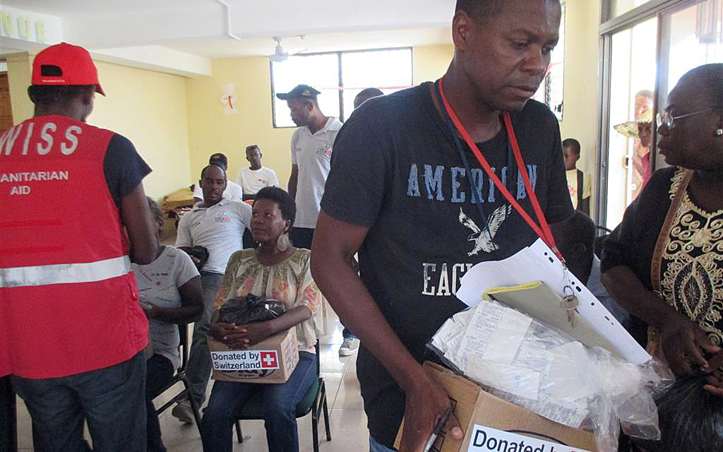 Haitians are being given boxes of hygiene products.