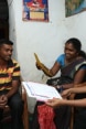 Family members excitedly examine their travel documents