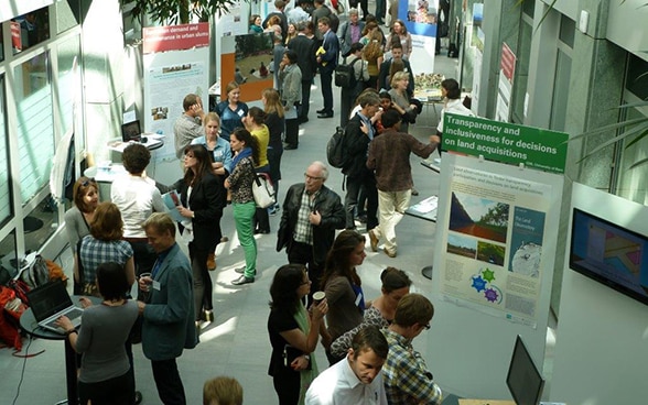 people visiting the research fair at the building of SDC 