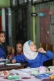 una classe con studenti ragazze