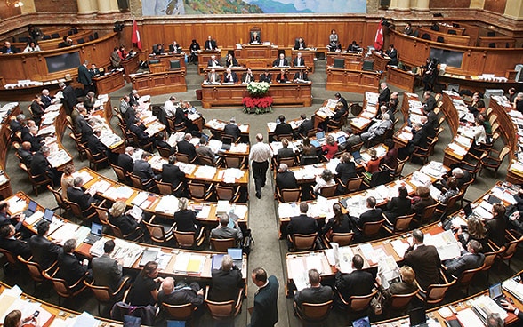Interior view of the parliamentary session in the Federal Palace in Bern. 