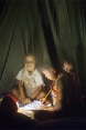 Three children sitting on the floor doing their homework.