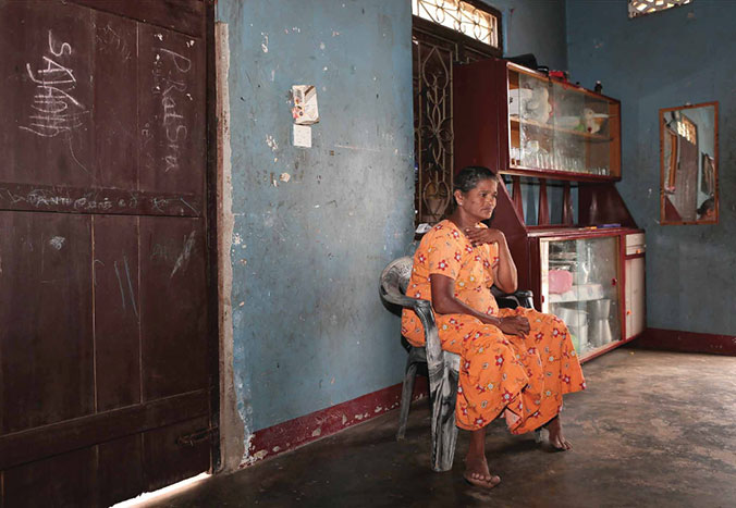 Kanageswari Chandrasegaram found herself alone with her four children after her husband died in the 2004 tsunami. Two of them are still living with her today. One of her sons had to leave school to work and help feed the family. © R.H. Samarakone/SDC