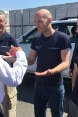 Didier Burkhalter speaking with three members of Swiss Humanitarian Aid in Ukraine.