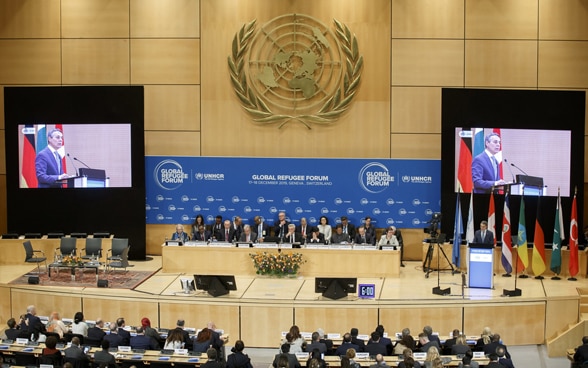 Le Conseiller fédéral Ignazio Cassis prononce son discours à l’occasion du premier Forum mondial sur les réfugiés, au siège européen des Nations unies à Genève.