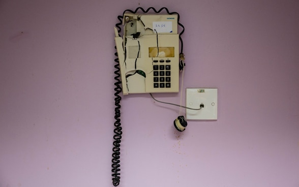 A phone at the St George's Hospital, which has been damaged in the explosion.