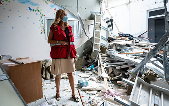 Ambassador Monika Schmutz Kirgöz in a hospital destroyed in the Beirut explosion last August.