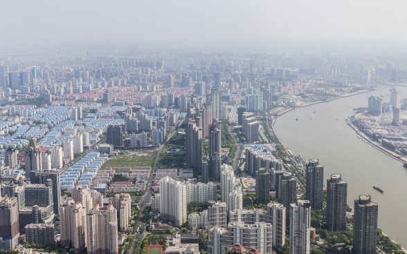 View over the smog-shrouded skyscrapers of Shanghai.