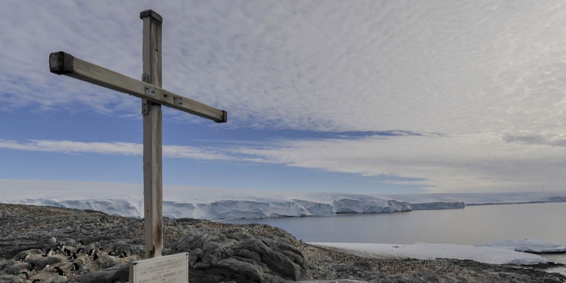 Wooden cross in memory of Belgrave Ninnis and Xavier Mertz on Cape Denison, Antarctica.