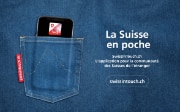 Un téléphone portable dans une poche de pantalon ornée du Cervin, annonçant le lancement de l’application SwissInTouch.