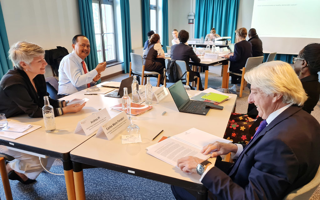 Participants in discussion during a workshop at the 2024 Giessbach Democracy Retreat in Switzerland.
