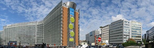 The contemporary interior of the Europa building in Brussels. The walls and facade are made of wood and glass.