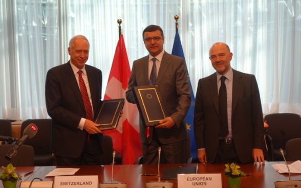 Agreement between Switzerland and EU for automatic exchange of information in tax matters: signing and consultation