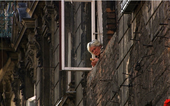 Woman looking out of the window